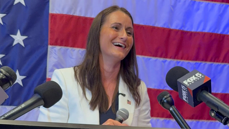Cait Conley addresses supporters after winning the primary
